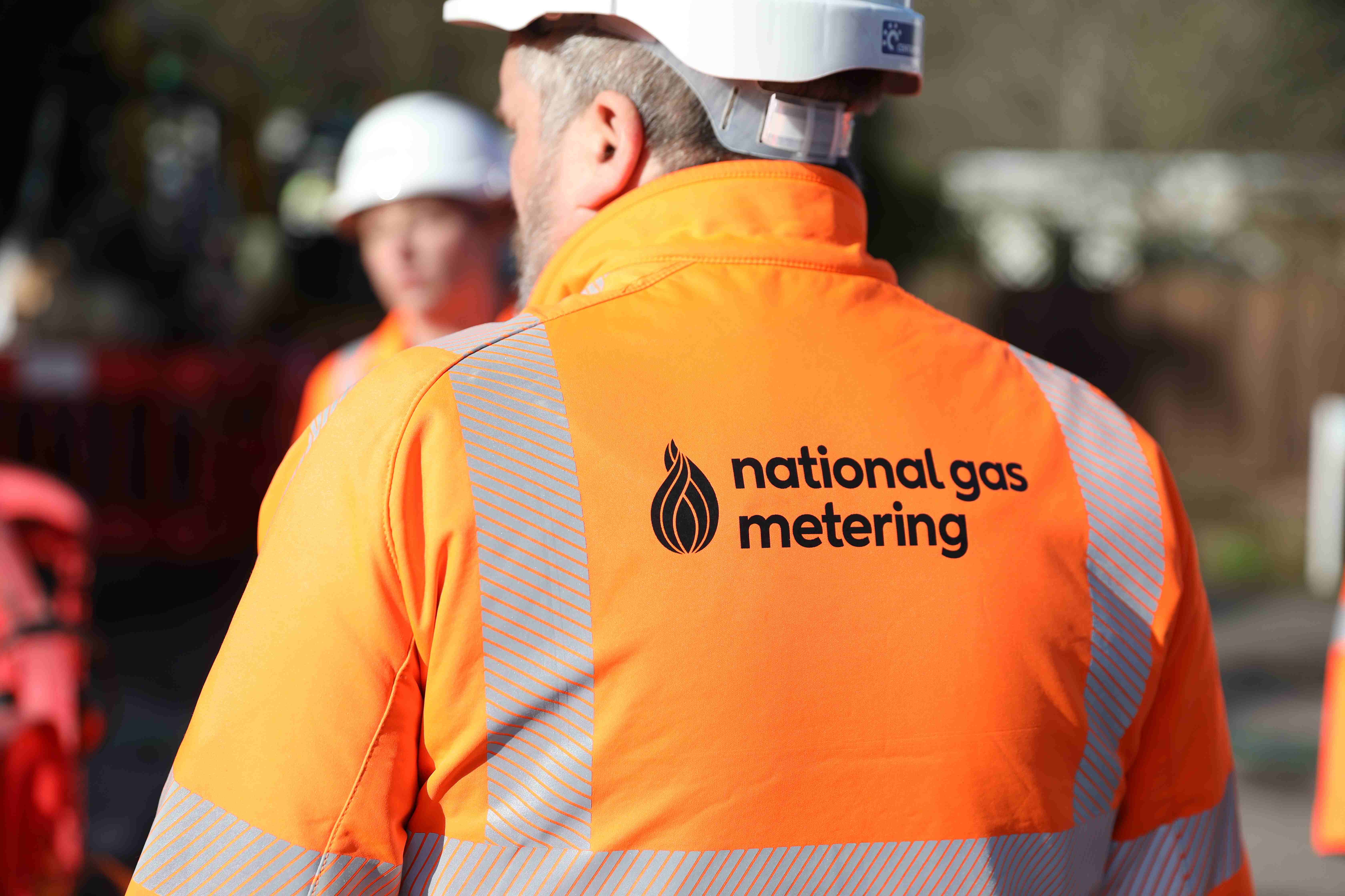 Man in National Gas Metering hi-vis jacket and helmet